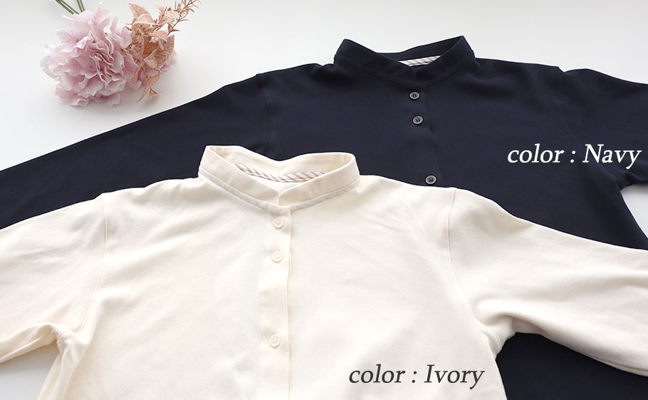 まるでシャツのような細目ステッチ、小さ目ボタン、スワローテール