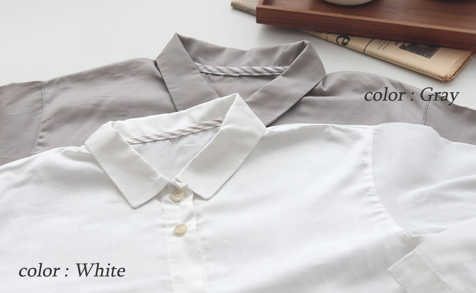 まるでシャツのような細目ステッチ、小さ目ボタン、スワローテール